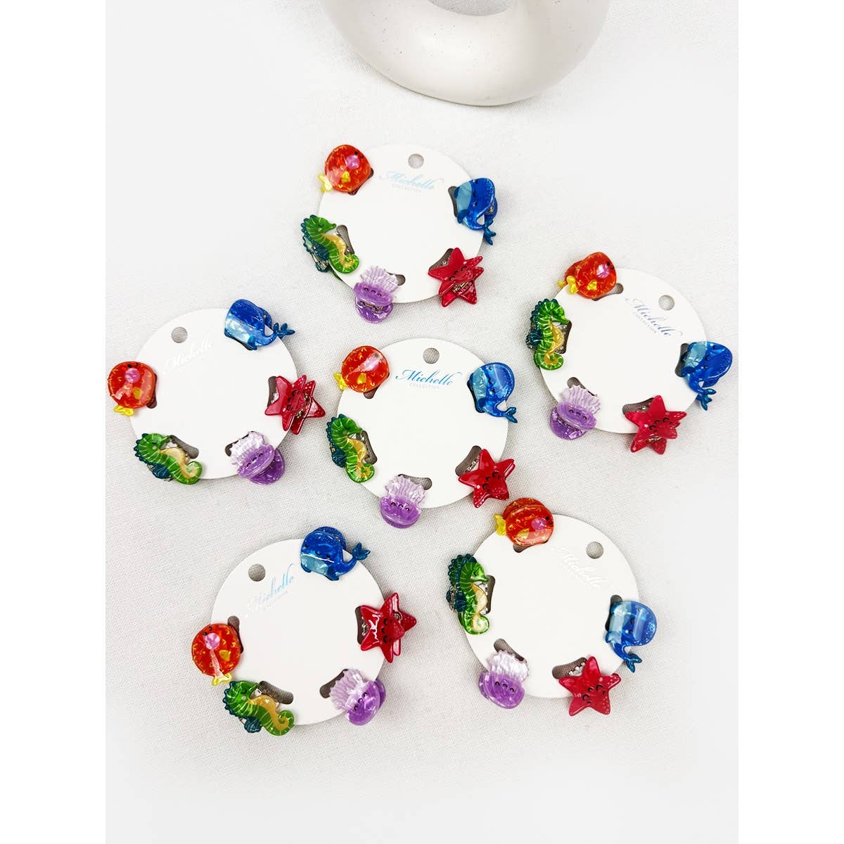 Colorful sea animal hair clips on a white background