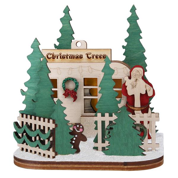 Chrismas tree lot ornamnet with  christmas tree, gingerbread man, Santa, and fence wooden figures.